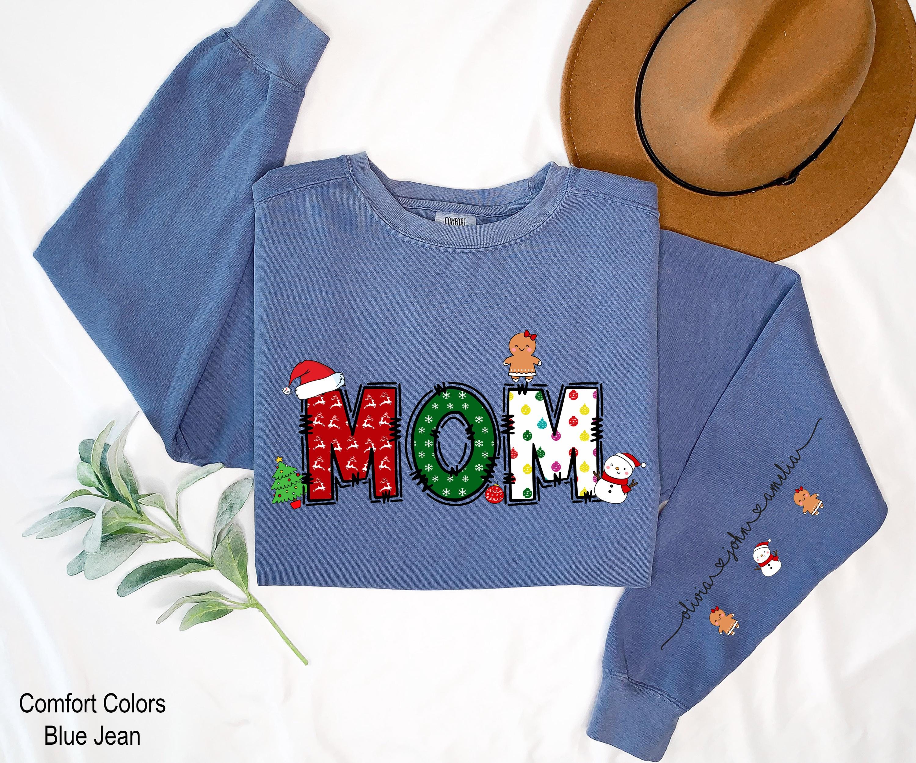 Mama Claus Sweatshirt With Kids On Sleeve Gift For Christmas, Christmas Mom Kids Name Shirt, Custom Christmas Nana Shirt, Grandma Gift