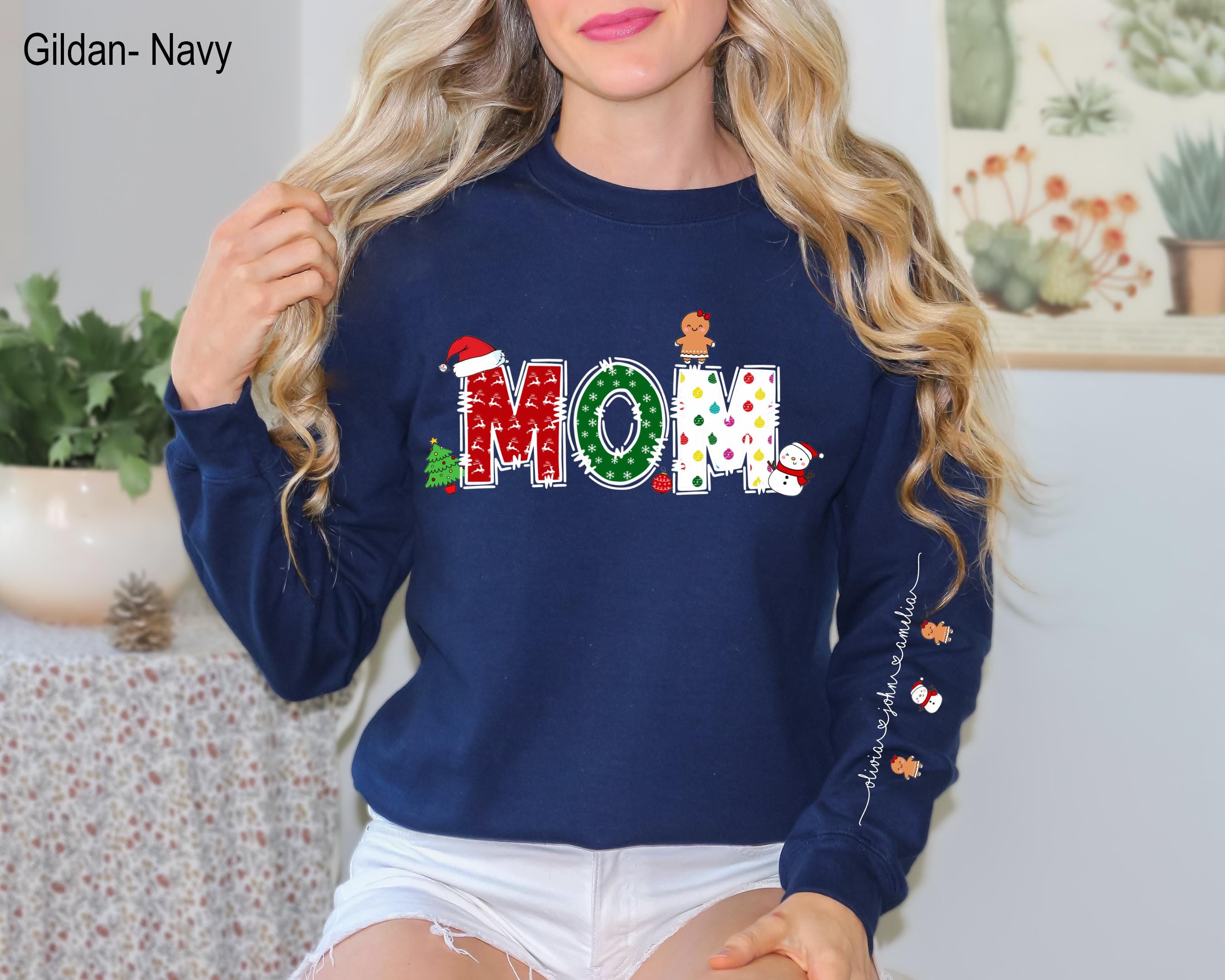 Mama Claus Sweatshirt With Kids On Sleeve Gift For Christmas, Christmas Mom Kids Name Shirt, Custom Christmas Nana Shirt, Grandma Gift