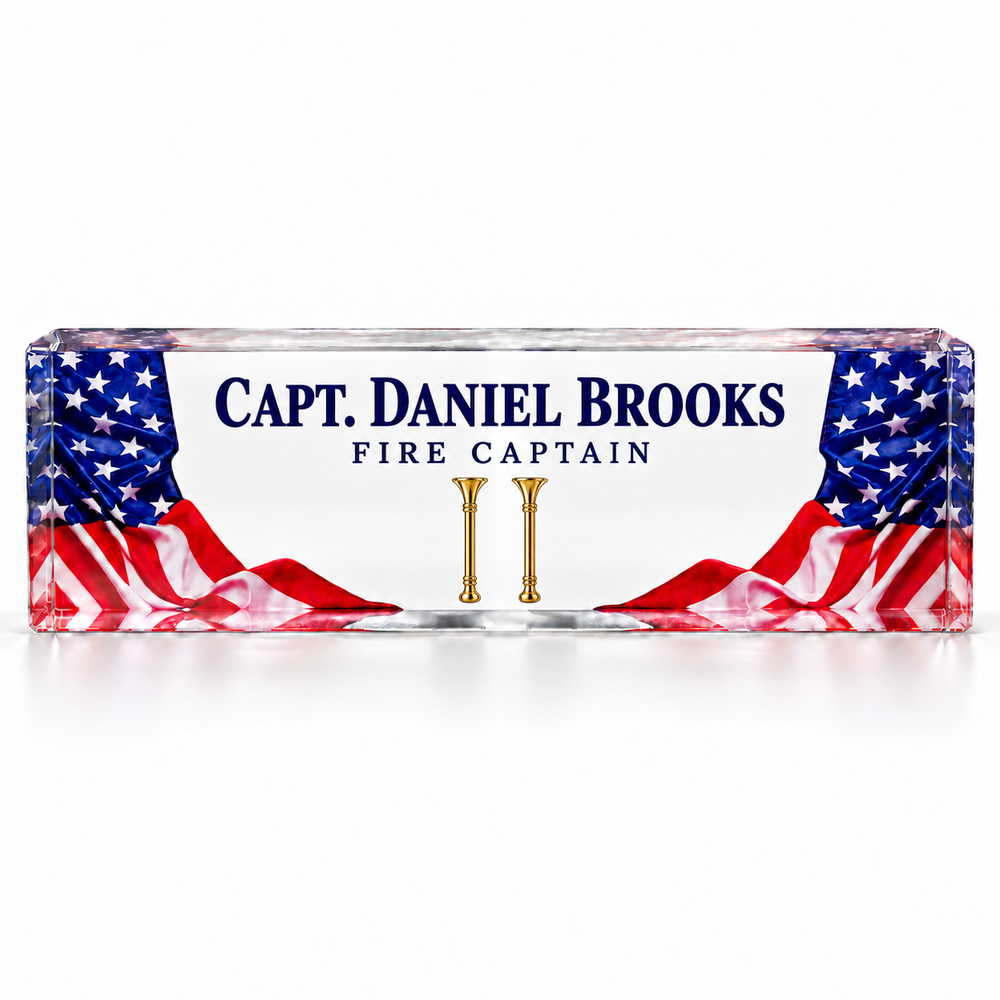 American flag crystal name plate with Fire Captain Daniel Brooks and two parallel gold bugles